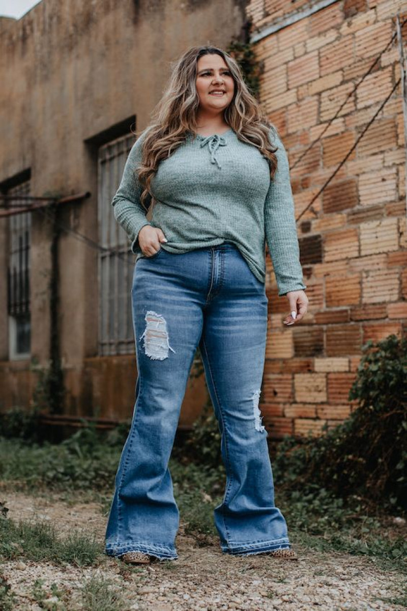 Plus Size Outfit Ideas: Light Blue Bell Bottom Jeans with Grey Blouse for Flare Jeans: plus-size clothing,  high-rise,  wide-leg jeans,  bell-bottoms,  western wear  