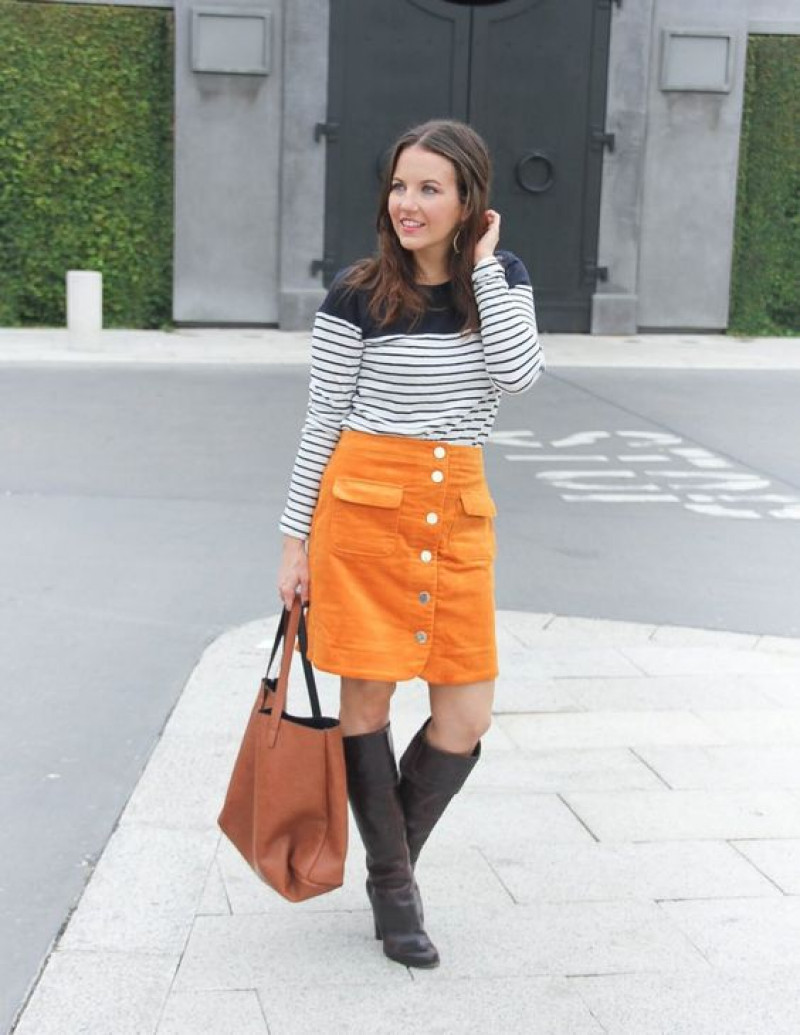 A Smart but Casual Way to Dress | Orange Pencil and Straight Skirt Corduroy Outfit Designs with T-shirt: leather skirt,  luggage and bags,  gray jeans  