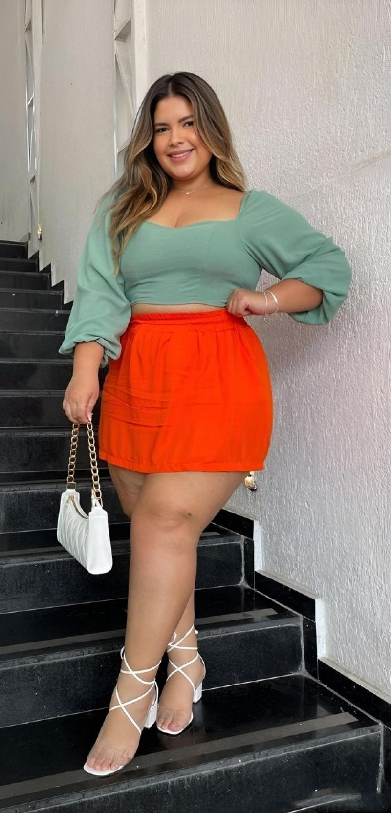 Green T-shirt for Plus Size Dating Outfits with Orange Pencil and Straight Skirt: hair m,  brown hair,  green t-shirt,  orange pencil and straight skirt,  white sandal,  green and orange,  green t-shirt and orange pencil and straight skirt Skirt  
