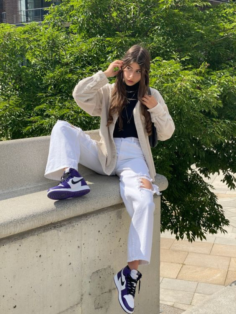 White Ripped Jeans, Cream Cardigan, Black Top, and Air Jordan 1 'Court Purple' Sneakers: active pants,  business casual,  nike air jordan i  