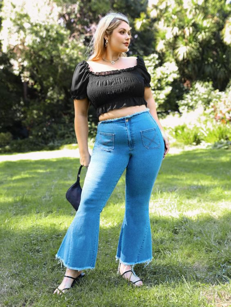 Plus Size Fashion Tips: Styling Light Blue Bell Bottom Jeans with a Black Crop Top: hair m,  long hair,  electric blue,  cobalt blue  