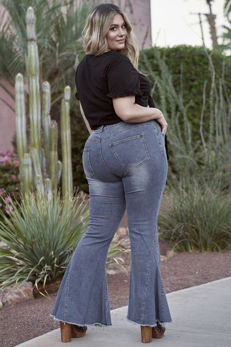 Plus Size Bell Bottom Outfit Ideas: Light Blue Casual Trousers with Black T-Shirt and Jeans: girls' outfit,  bell-bottoms,  ripped bell bottom jeans  