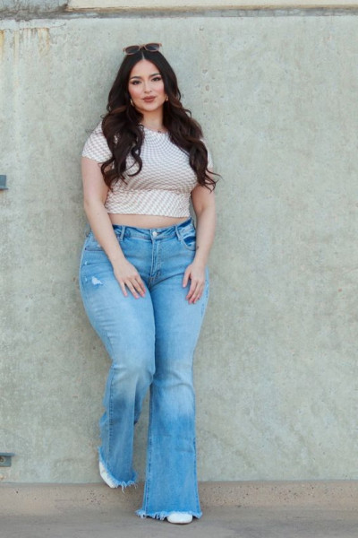 Plus Size Chic trends with jeans, shirt, denim, trousers, bell-bottoms,: plus-size clothing,  high-rise,  bell-bottoms,  mid rise,  light blue casual trouser,  white blouse,  white and light blue,  white blouse and light blue casual trouser  