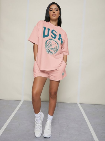 Effortless attire with shirt, shorts, t-shirt, tracksuit, sportswear: white trainer,  pink t-shirt,  pink casual short,  white classic sock sock,  pink and pink,  pink t-shirt and pink casual short  